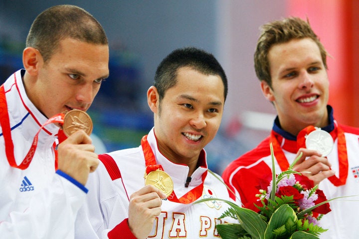 アテネ、北京五輪の金メダリスト北島さん（中）が、東京都水泳協会の会長に就任した。（C)Getty Images