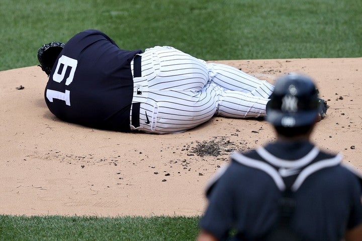 強烈な打球が直撃した田中。危ぶまれた健康面には影響は少なそうだが、指揮官は慎重な姿勢を崩さず。(C)Getty Images