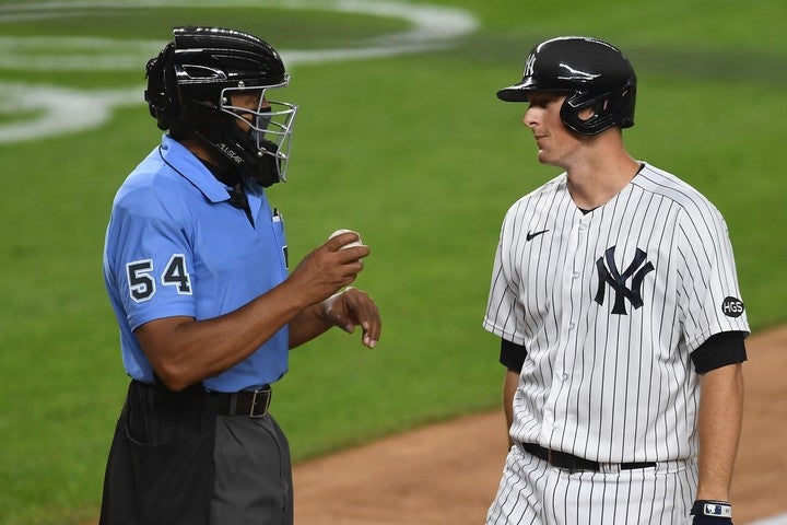 疑惑の判定を連発したバックナー(左)。ヤンキースの選手たちは不満の表情を浮かべていた。(C)Getty Images