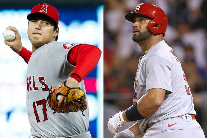 今季200奪三振を達成した大谷（左）と通算700本塁打に到達したプーホルス（右）。またしても歴史に名を刻んだ。(C)Getty Images