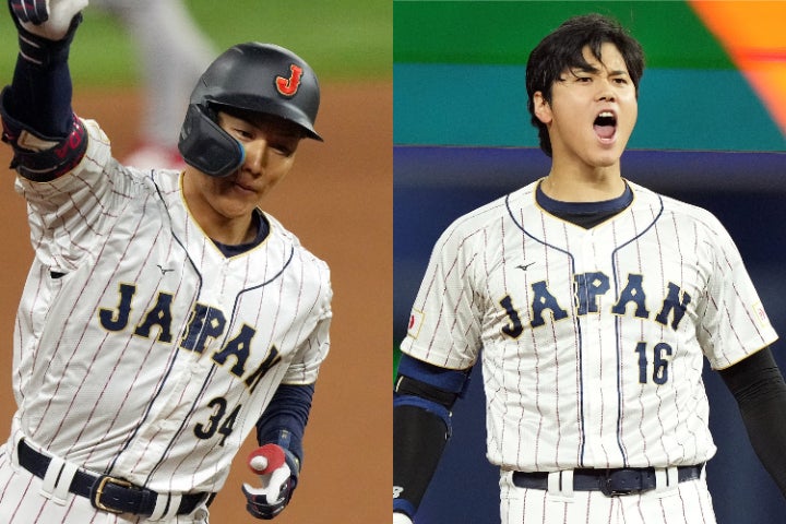 ７回に同点３ラン本塁打を放った吉田（左）を称えた大谷（右）。(C)Getty Images