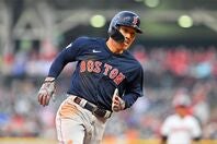 ２塁打含む３安打の活躍を見せた吉田正尚。(C)Getty Images