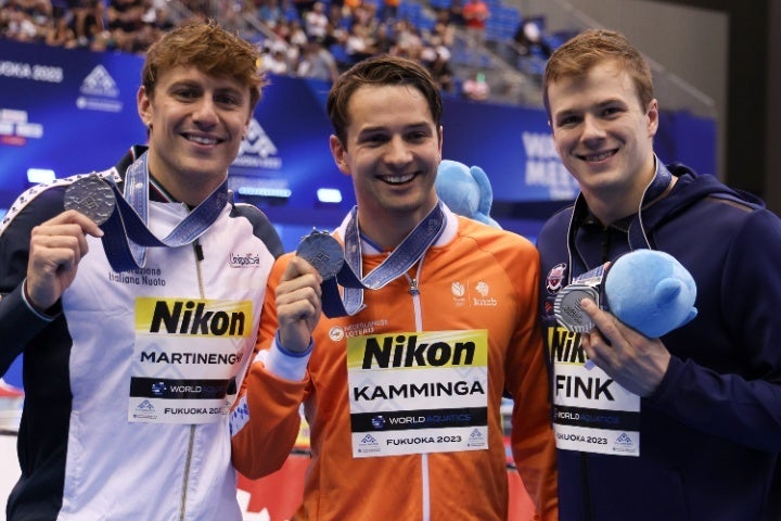 男子100m平泳ぎで銀メダルを３人が獲得。左からマルティネンギ、カミンハ、フィンク。(C) Getty Images