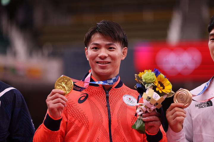 兄妹同日優勝で初の五輪金メダルを手にした阿部。(C) Getty Images