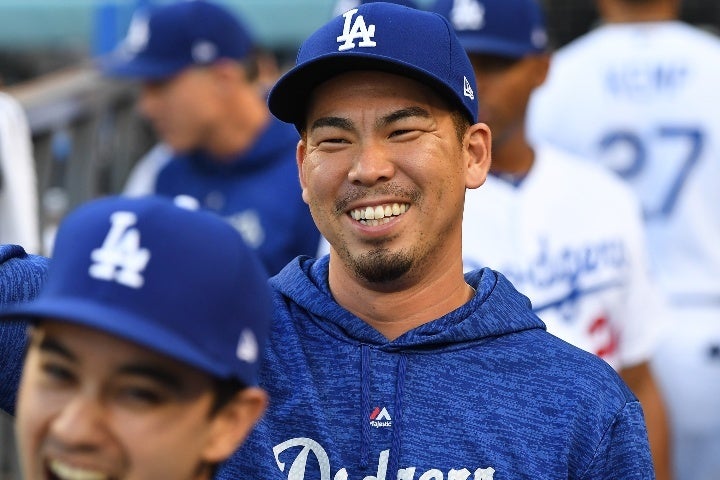 前田健太（中央）の通訳を務めたアイアトン（手前）氏。(C) Getty Images