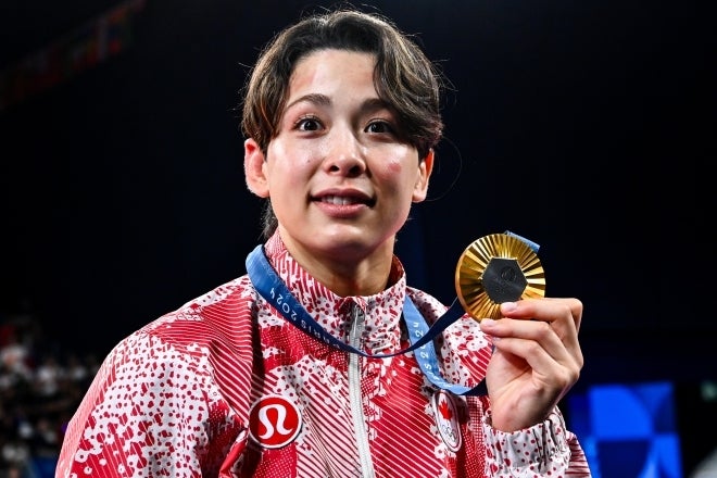 初の五輪出場で金メダルに輝いた出口。(C)Getty Images