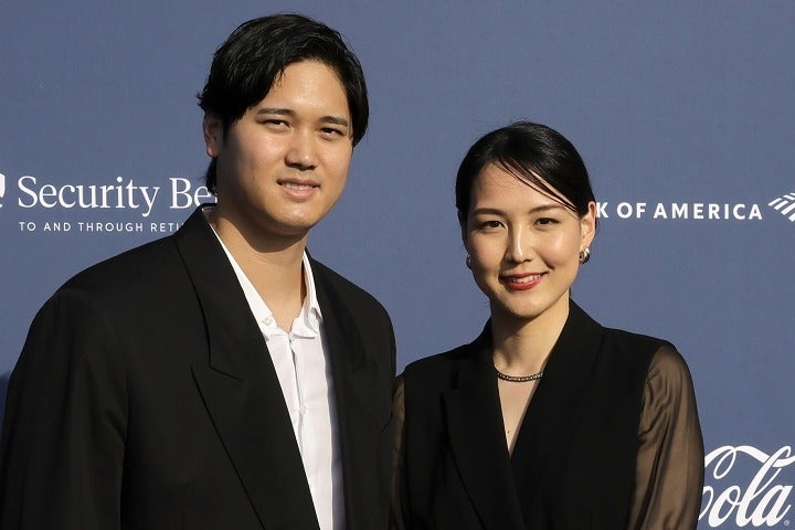 妊娠を発表した大谷（左）と真美子さん（右）。(C)Getty Images