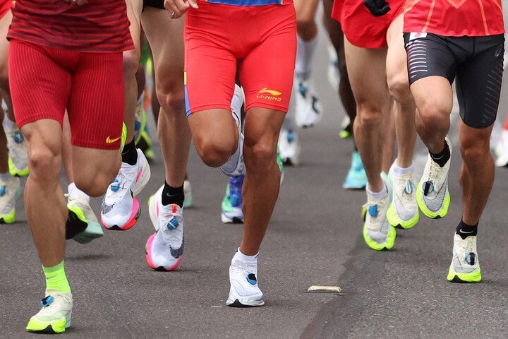 選手を先導する白バイが視聴者に異例のメッセージを呼びかけた。(C)Getty Images　※写真はイメージです