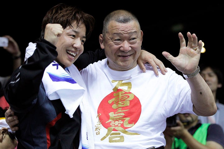 五輪女子レスリングで２度の銅メダルに輝いた浜口京子さん（左）と父・アニマル浜口氏（右）。(C) Getty Images