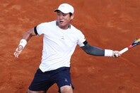 全仏オープン１回戦でポピリンと対戦した西岡は、第３セットの序盤で腰痛が悪化しプレーを断念した。（※写真は今月初旬のイタリア国際）。（C）Getty Images