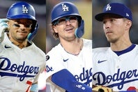 マンシーの怪我により、三塁はロハス（左）、キケ・ヘルナンデス（中）、エドマン（右）のリレー体制に。(C)Getty Images