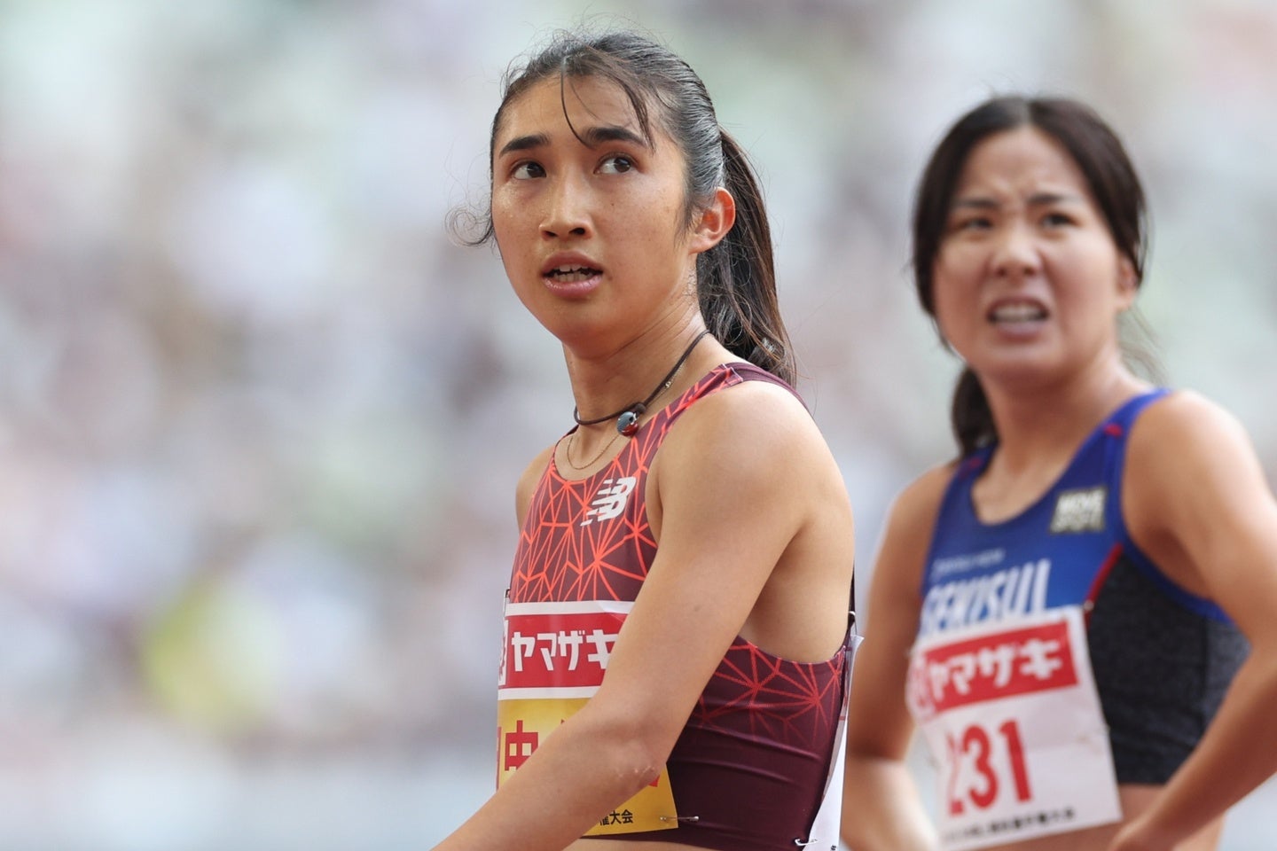 圧巻の走りをみせた田中。大会６連覇を飾りタイムを確認する。写真：永島裕基