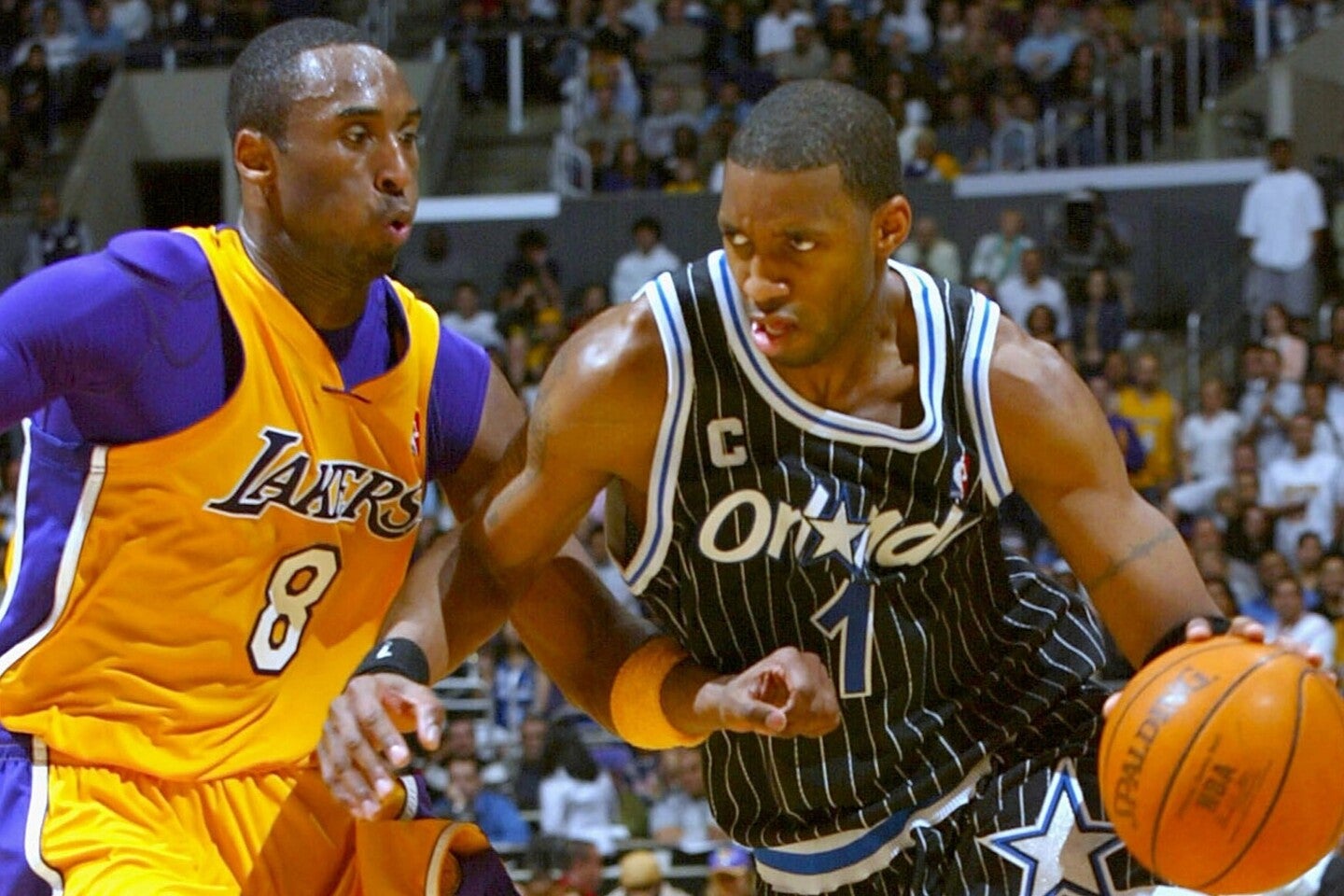 2003年、T-MAC（右）はコビー（左）を振り切り得点王に輝いた。(C)Getty Images