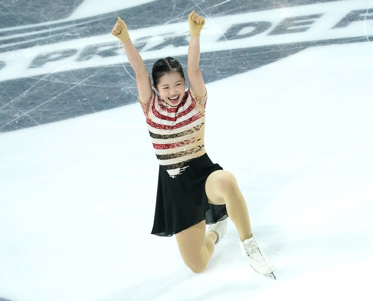 シニアデビュー戦で３Aを成功した中井。演技後はガッツポーズを出した。(C)Getty Images