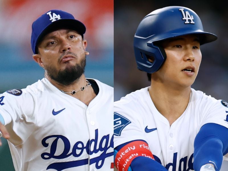 ドジャースの内野手キム・ヘソン（右）とロハス（左）が話題のチャームを付けて出勤する姿が話題だ。（C）Getty Images