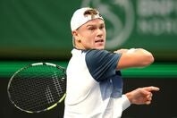 大会期間の拡大により収益はアップしたものの選手への負担が増したことに関して、試合中のケガで苦しむルネをはじめ多くの選手が苦言を呈している。(C)Getty Images