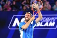 わずか１ポイントで勝敗が決する「ワンポイントスラム」で優勝したテニスコーチのスミス氏は、一夜にして億万長者となったことで人生が大きく変わろうとしている。(C)Getty Images