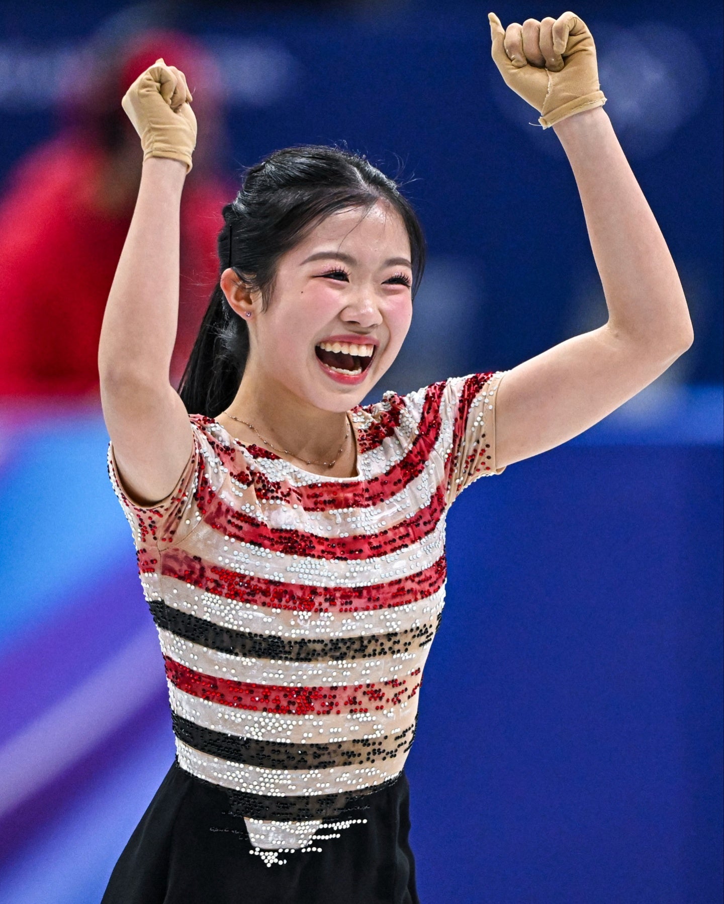 17歳の中井がSP首位発進。３Aを成功する衝撃の五輪デビュー戦となった。(C)Getty Images