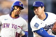 現地15日の一戦で、11球にも渡る好勝負を演じた大谷（右）とリンドーア（左）。(C)Getty Images