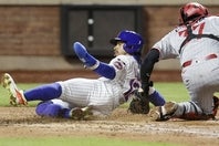 ツインズ戦で勝ち越しとなる生還を果たしたリンドーア。ただ、この走塁で負傷しIL入りした。(C)Getty Images