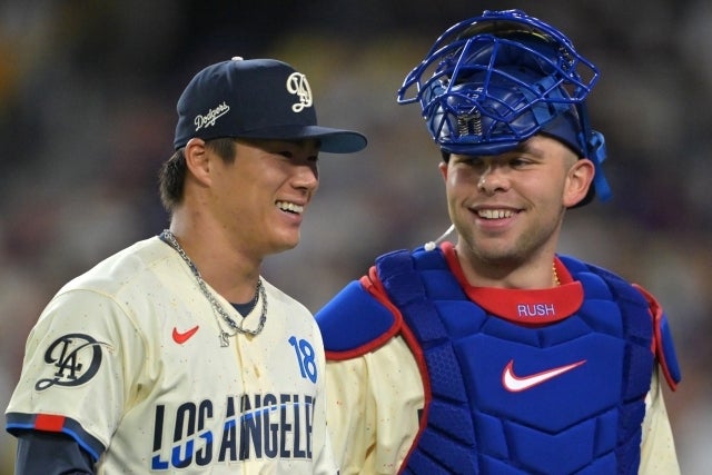 エンジェルス戦でバッテリーを組んだドジャースの山本（左）とラッシング（右）。(C)Getty Images