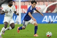 “ペドリとフェルミン・ロペスのハイブリッド”と表現された佐藤。(C)Getty Images