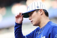 日米通算100勝を達成した山本。粘りのピッチングでメッツ打線を６回１失点に抑えた。(C) Getty Images