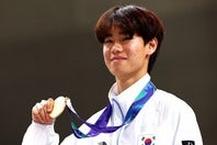 受け取った金メダルに傷が入っていたと告白したスケートボード韓国代表のカン・ジュニ。(C)Getty Images